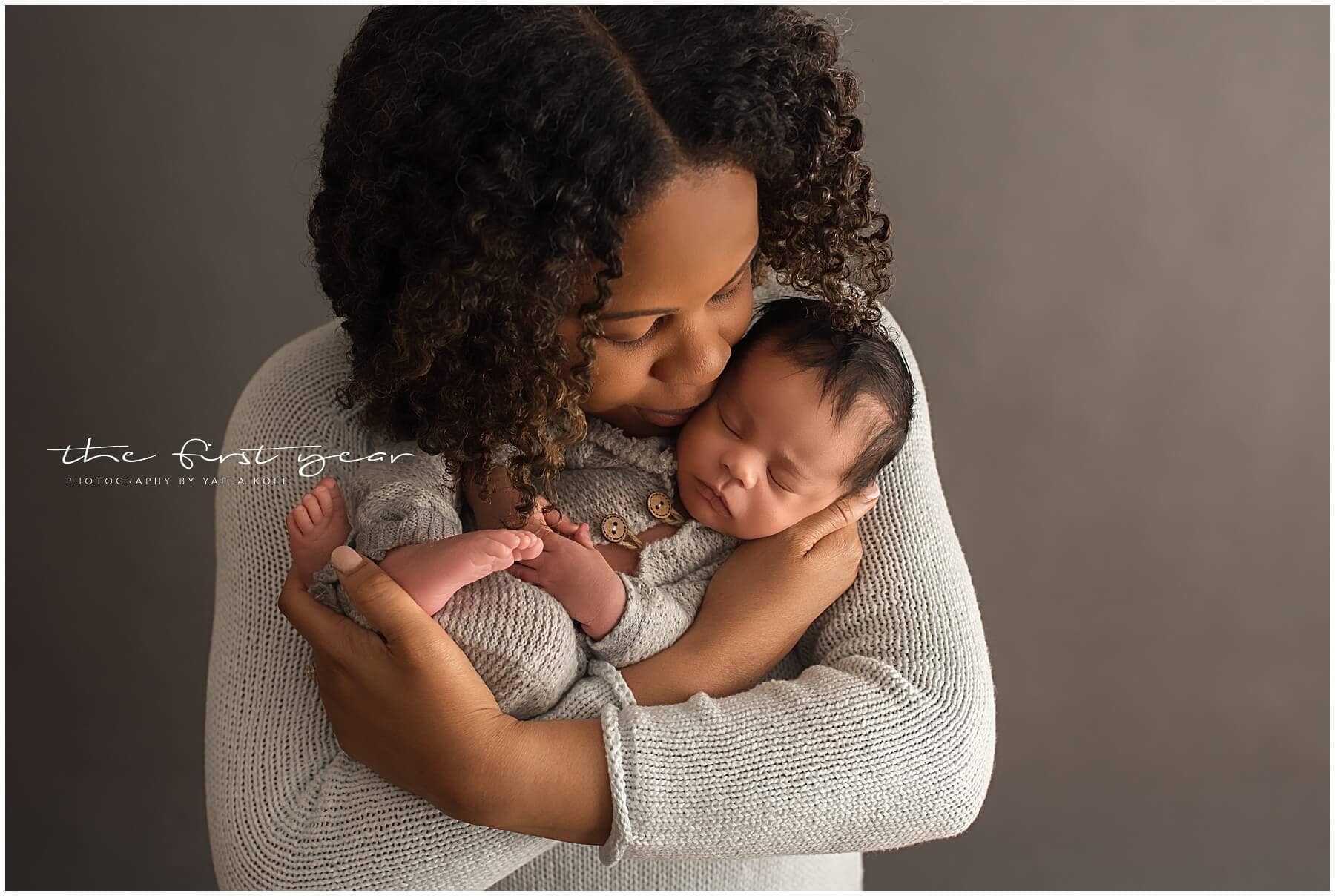 Newborn portrait of Baby Maxwell with mother, capturing a loving moment in Maryland.