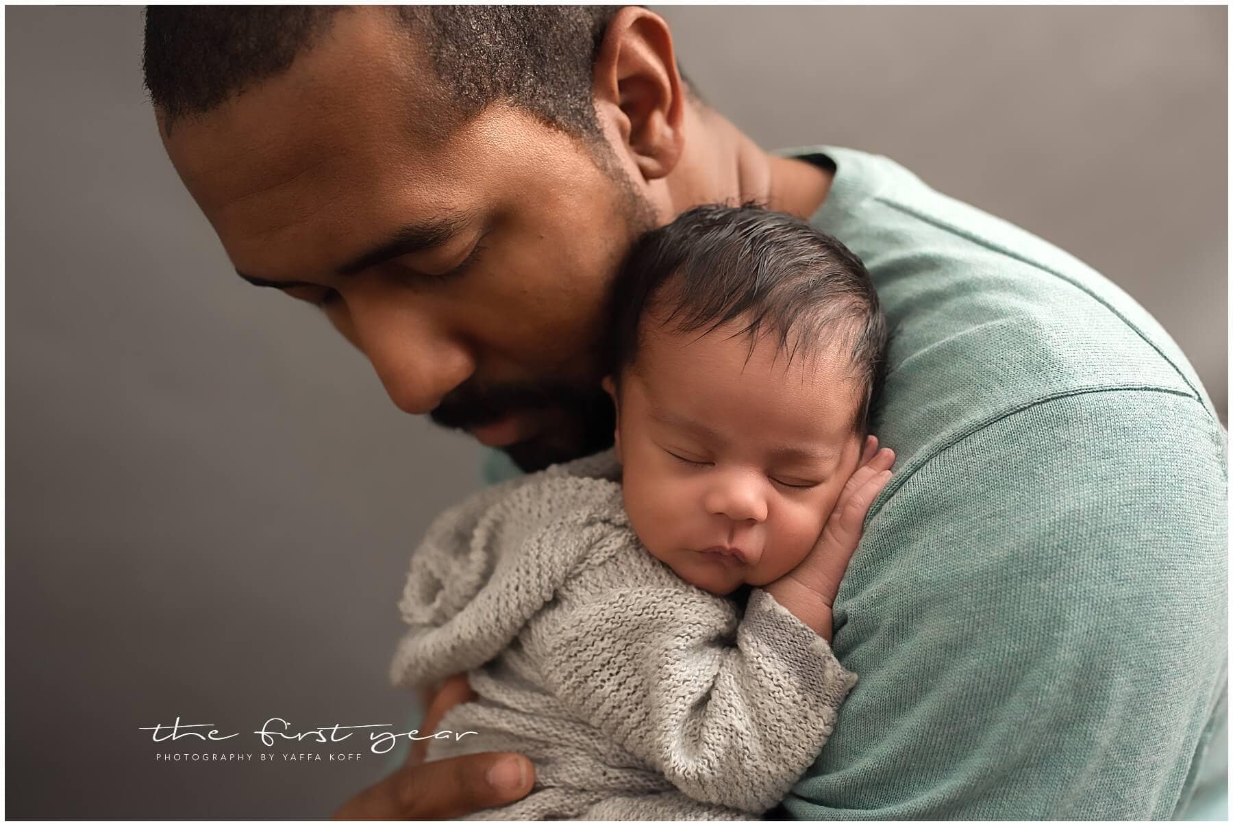 Newborn portrait of Baby Maxwell with father in Maryland.