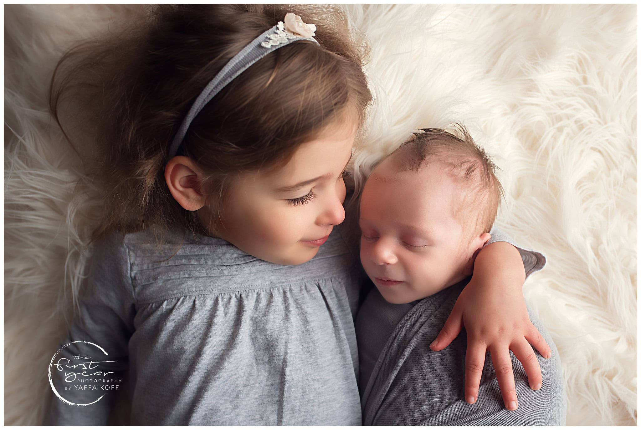 Newborn and sibling photography of Baby Rami and sister in Silver Spring, MD.