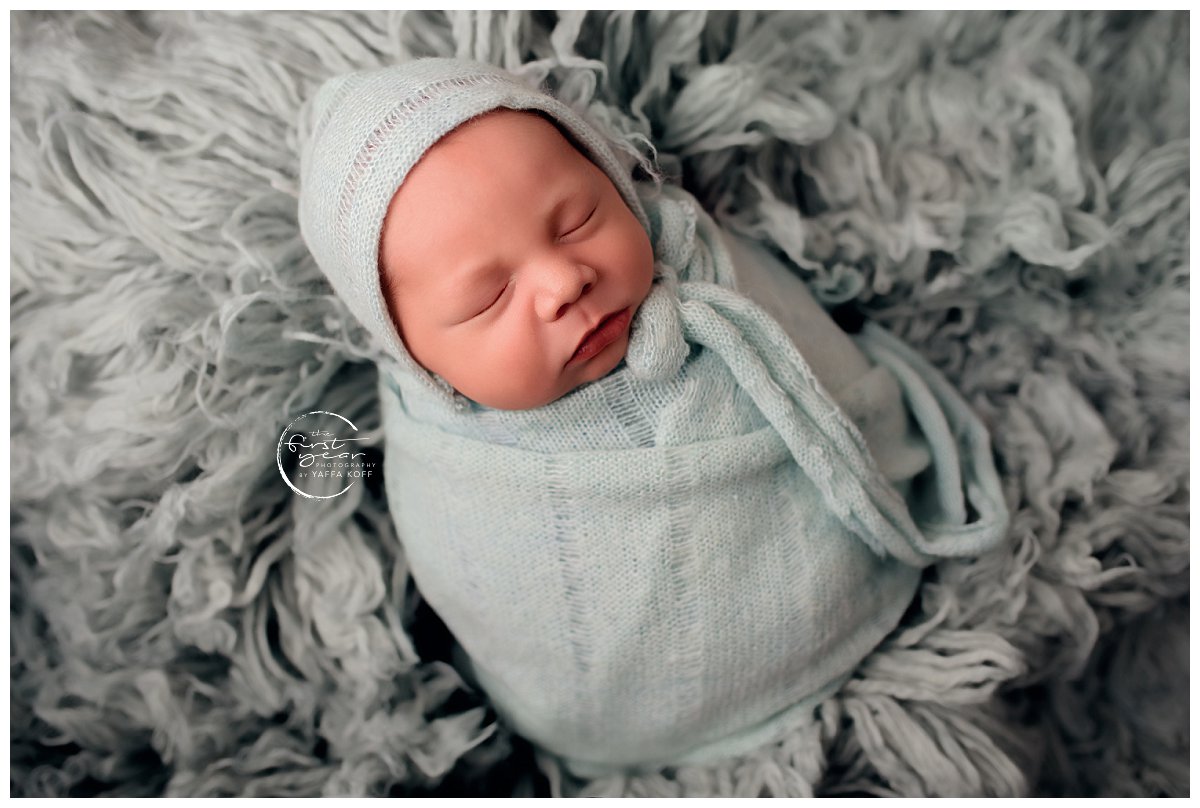 newborn boy wrapped up