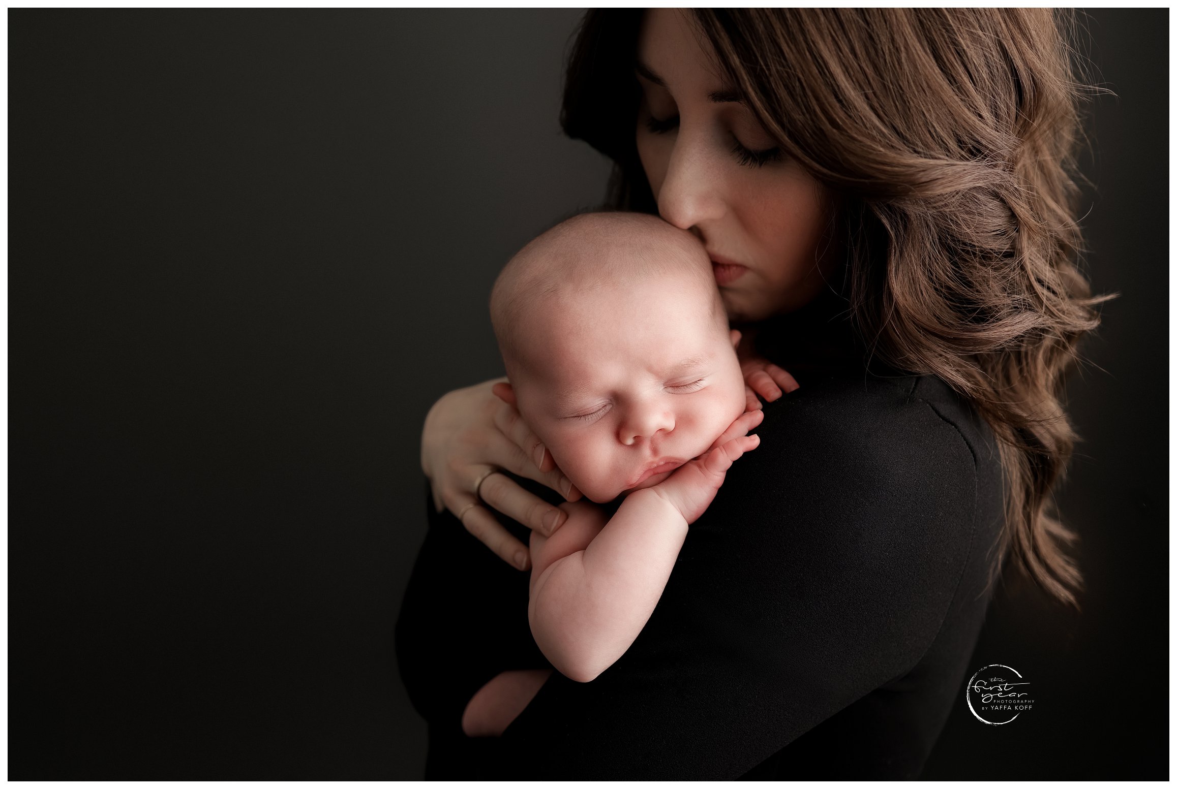 Baby lays on mom's shoulder for Norma Fayak Photography