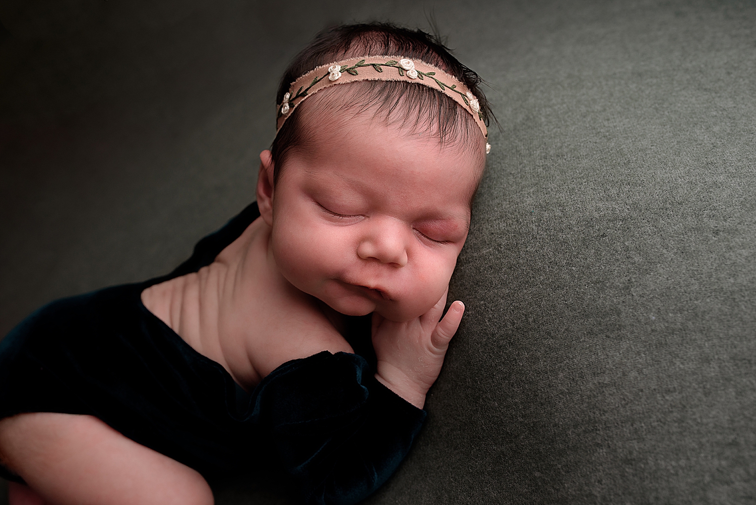sweet baby girl in headband by Silver Spring Newborn Photographer